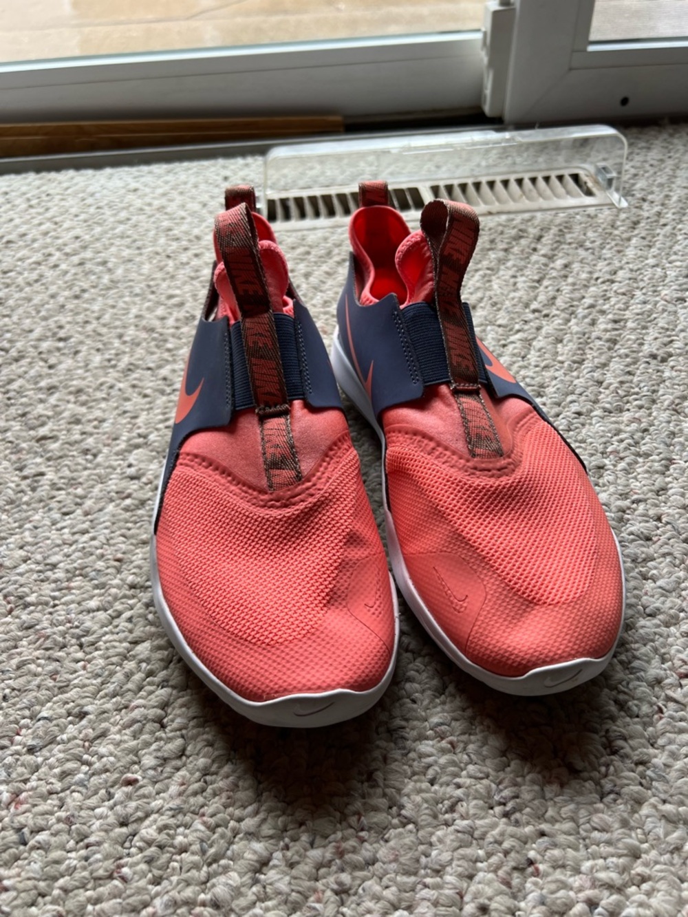 Nike Kids Slip-On Sneakers in Coral and Navy